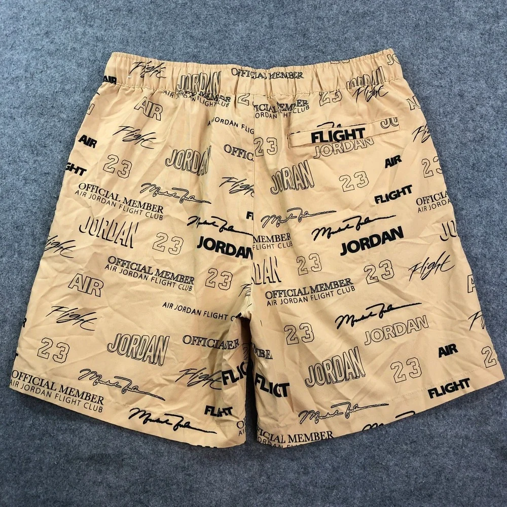 Jordan Mens Flight Club Shorts Medium Tan All-Over Print Graphic Drawstring